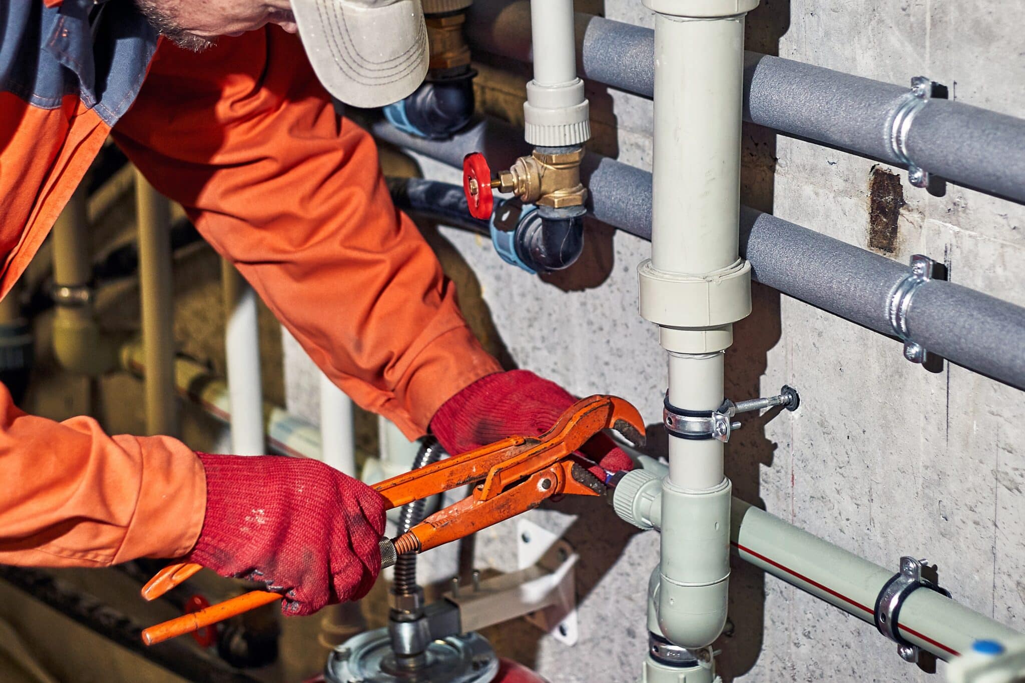 Inspecting pipes, Plumbing Efficiency.