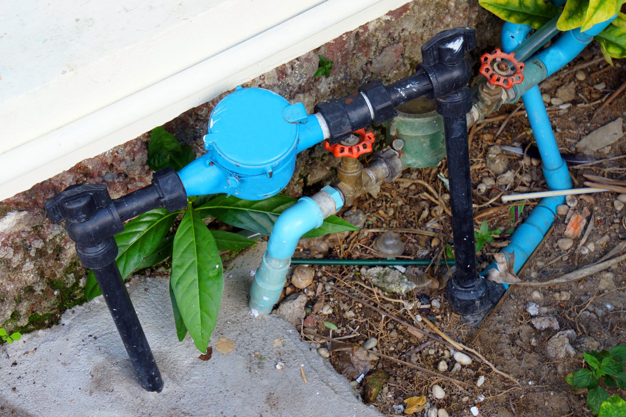 Water pipe and meter with waterspout on ground floor, Water Meter Leak.