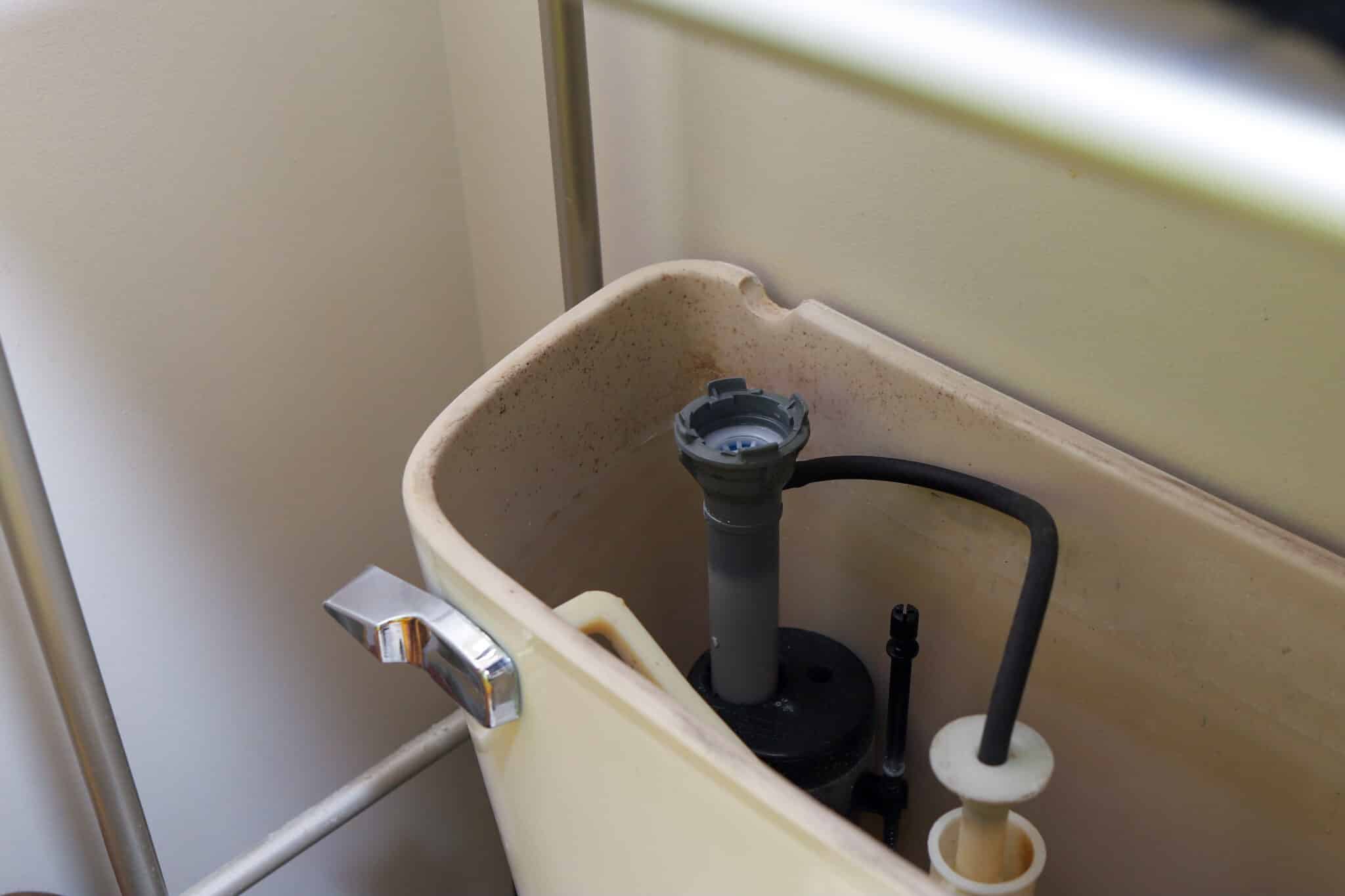 Checking toilet flush valve, Toilet Running.