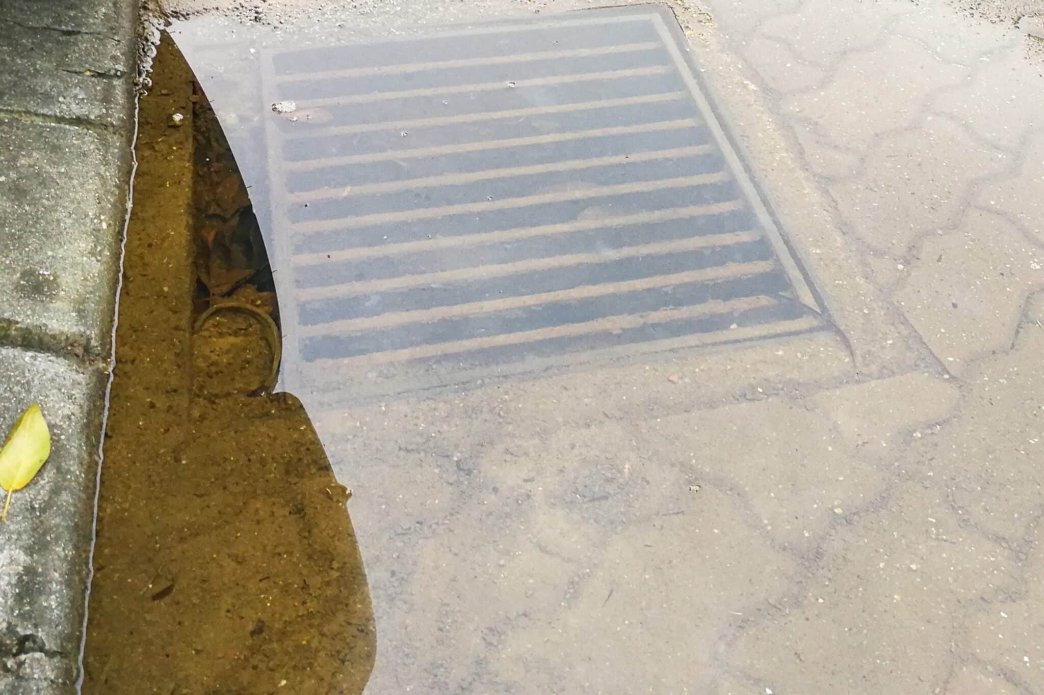 Rain due to badly clogged drainage system, Floor Drain Backups.